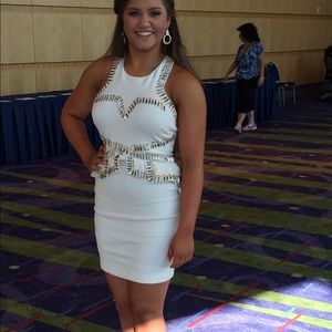 Bebe gold and silver embellished peplum dress